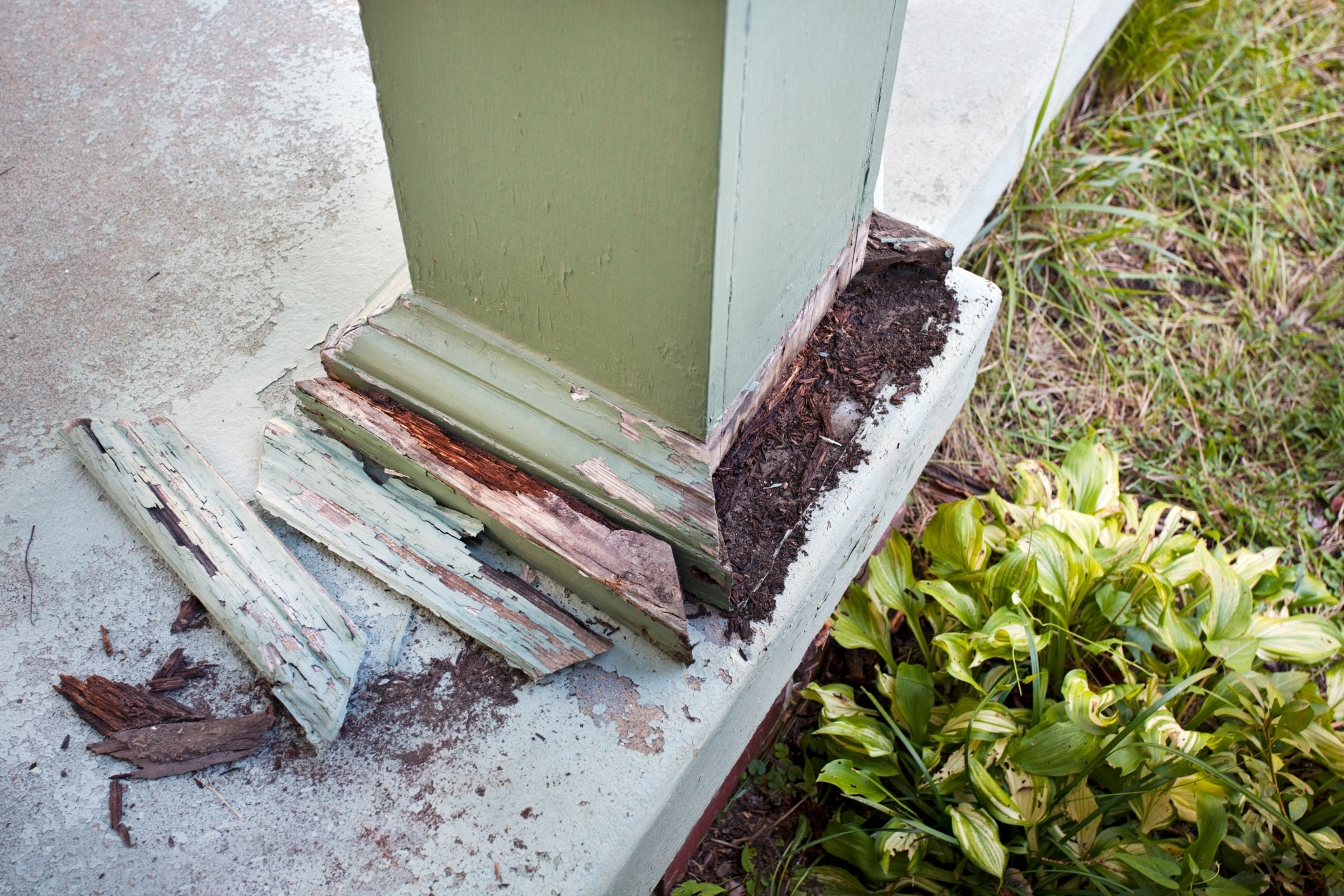 porch post shows severe termite damage